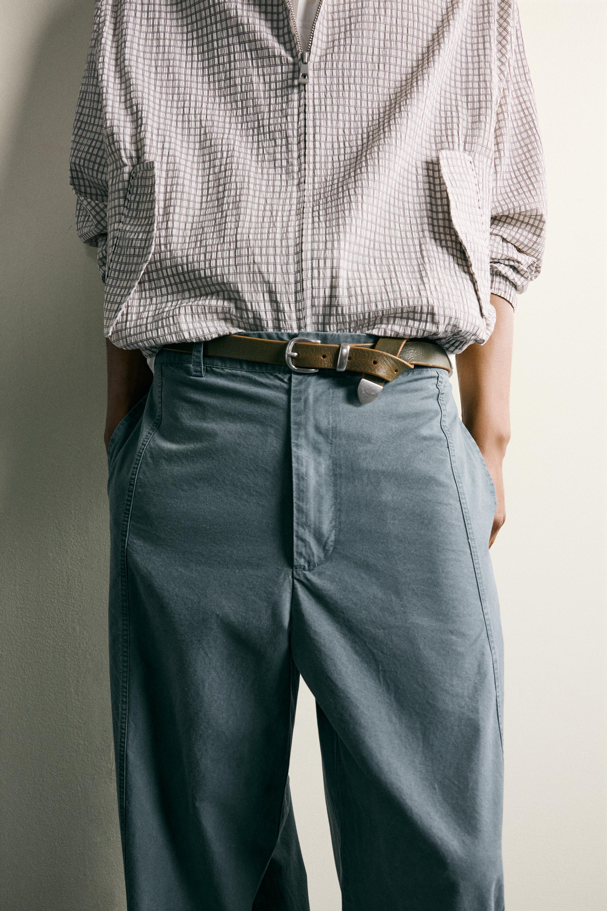PANTALON DÉLAVÉ COUPE DÉCONTRACTÉE AVEC PATTES